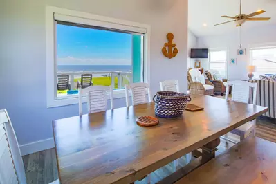 Enjoy ocean views from the living room, dining area, kitchen and back deck.