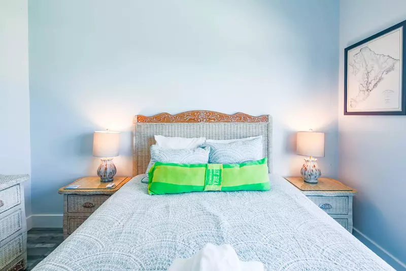 The queen guest bedroom also has a dresser.