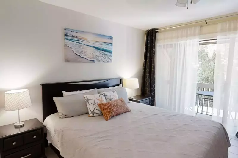 Bedroom #1 with private balcony