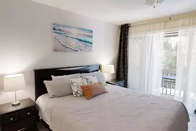 Bedroom #1 with private balcony