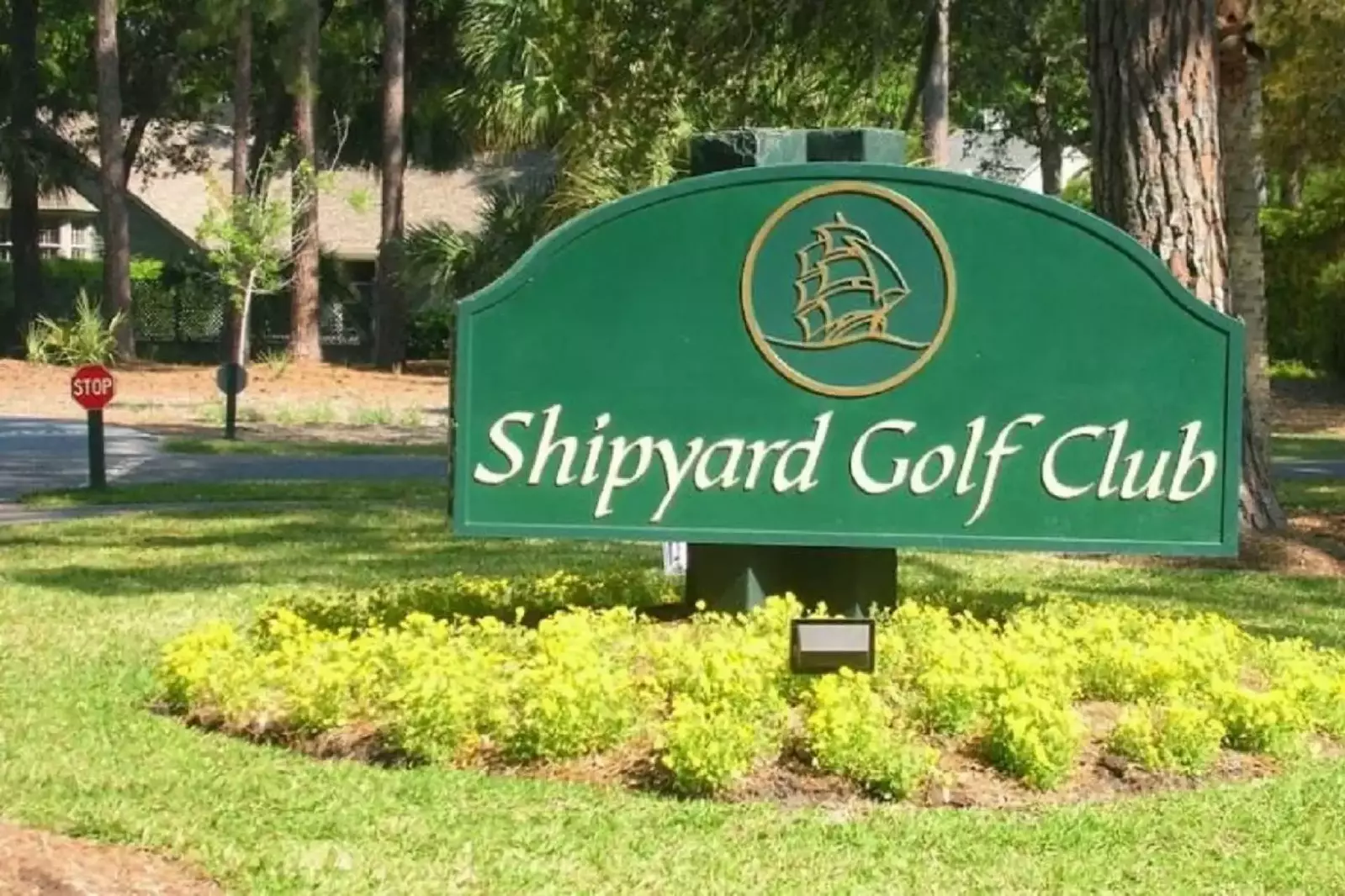 The house is adjacent to Shipyard's Golf Club driving range.