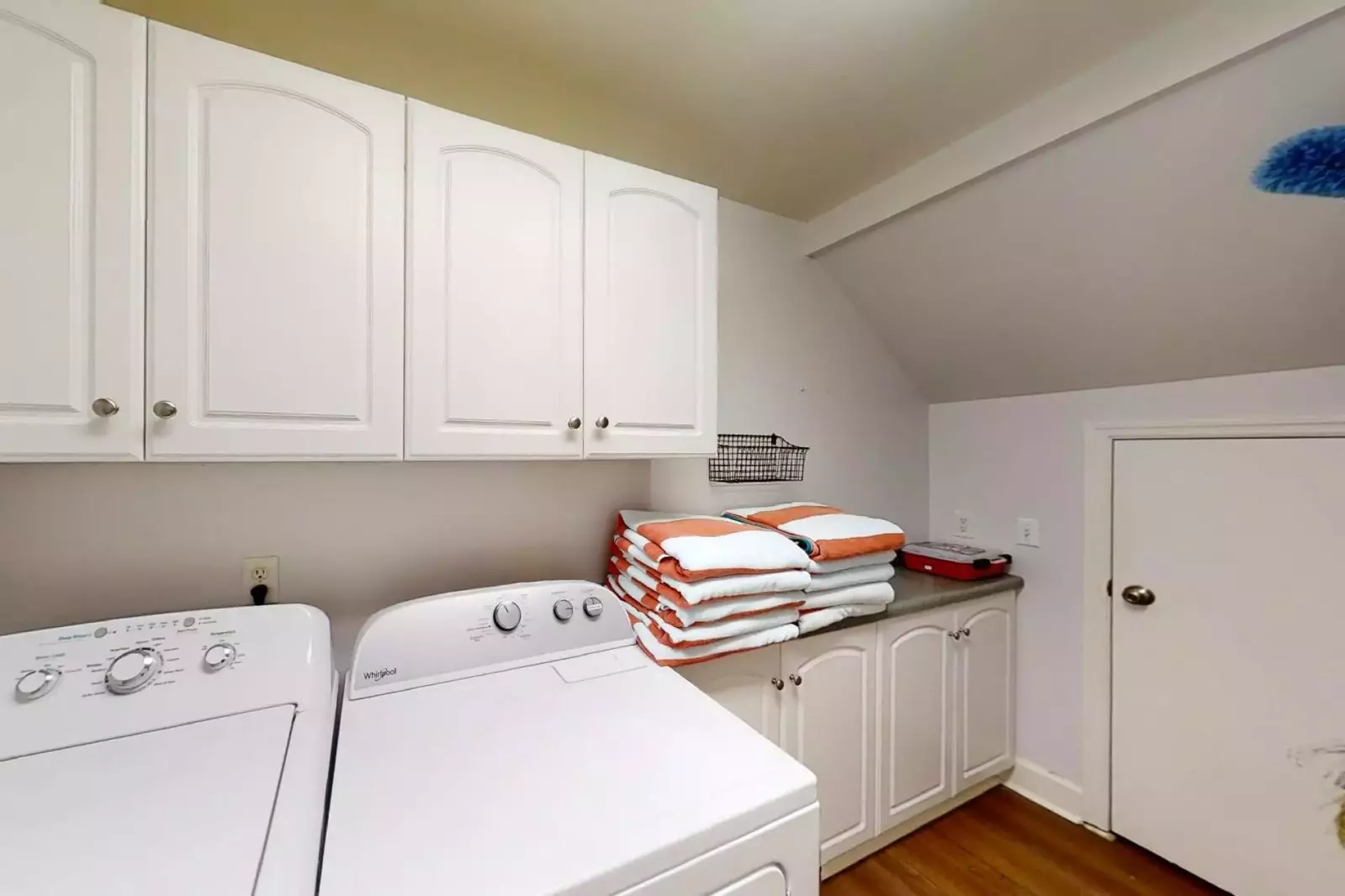 Laundry room with full size washer and dryer