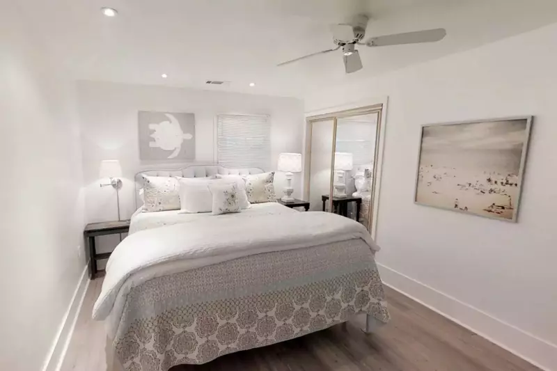 The tranquil master bedroom with king size bed and en suite bath