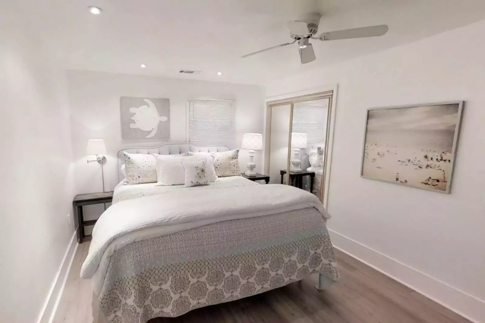 The tranquil master bedroom with king size bed and en suite bath