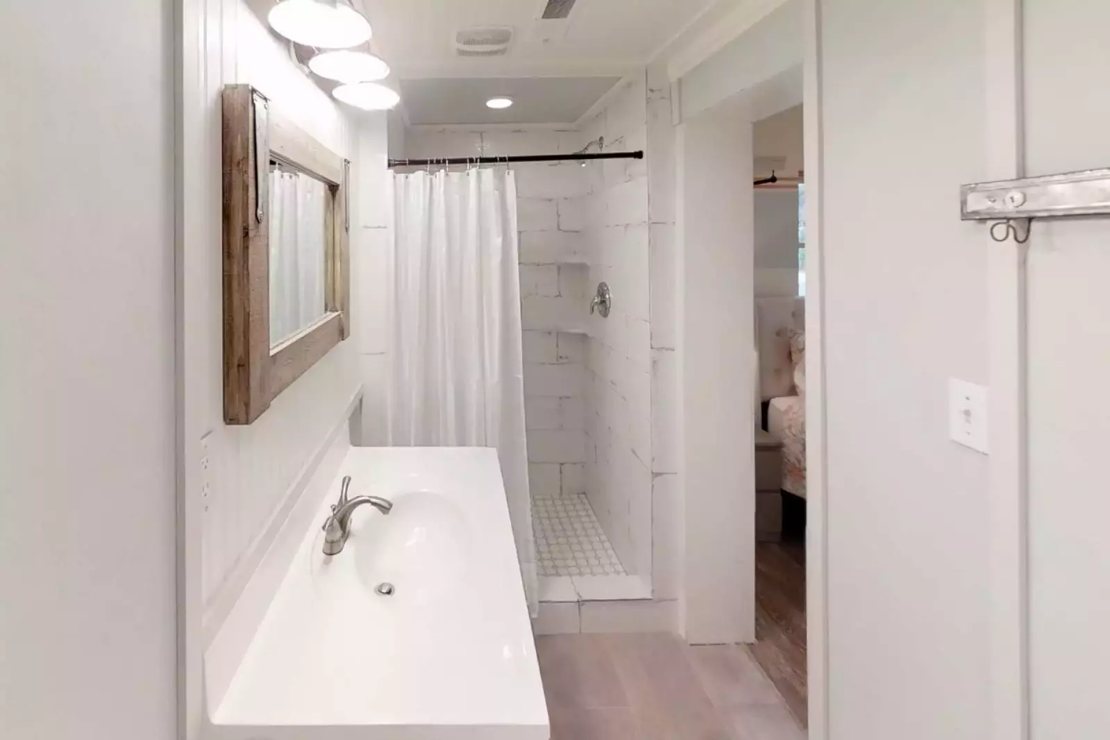 En Suite Bath #2 features a large walk-in shower with beautiful tile work