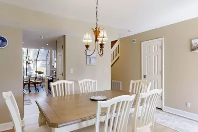 Dining table seats 6 comfortable with additional seating for 4 in the kitchen
