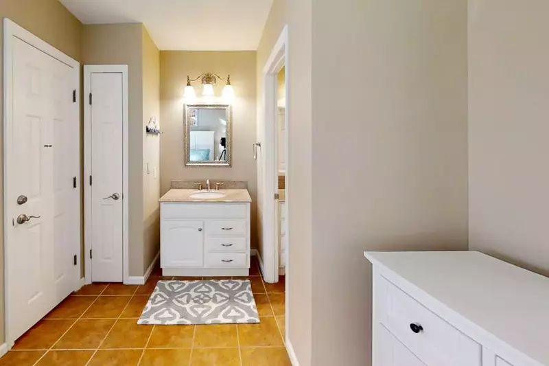 Master bedroom offers two vanities
