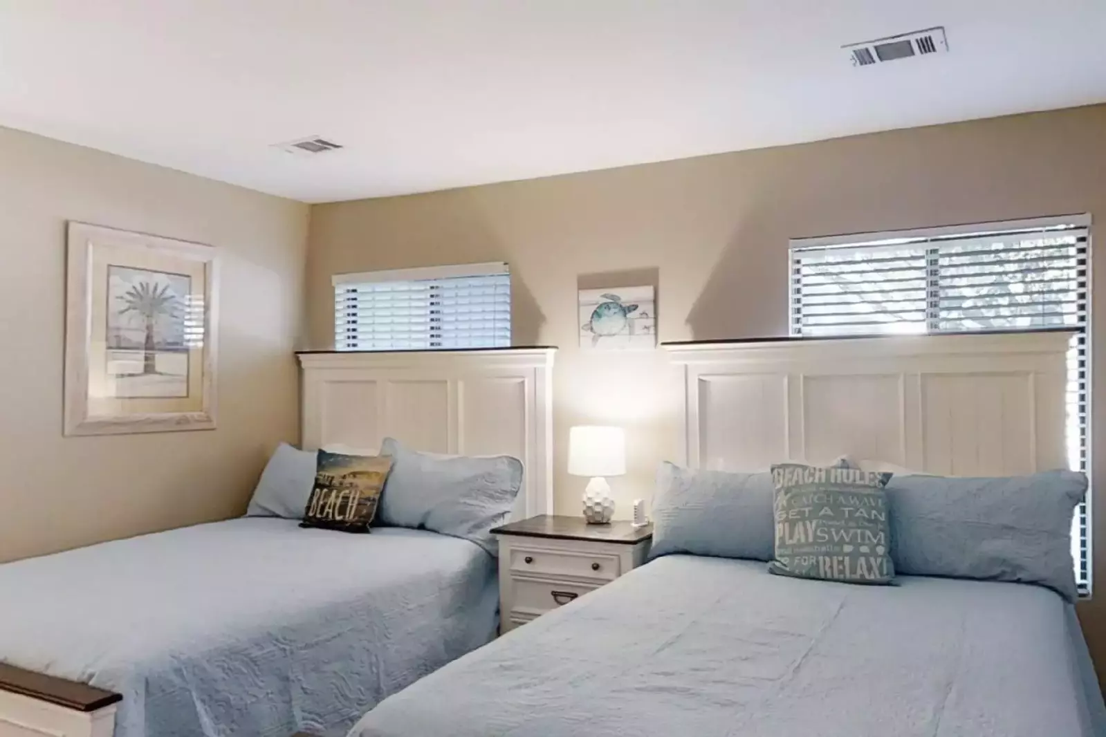 Guest bedroom located on second level with 2 queen beds