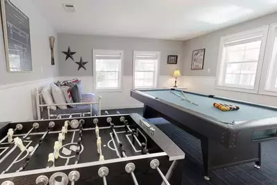 The game room located on the ground level complete with a foosball table and a pool table...let the fun begin!