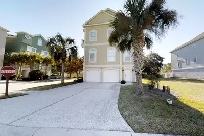 The large driveway provides ample parking.