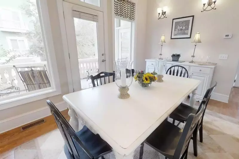 The second floor outdoor balcony has seating for four and is ideal for enjoying your morning coffee or an evening beverage