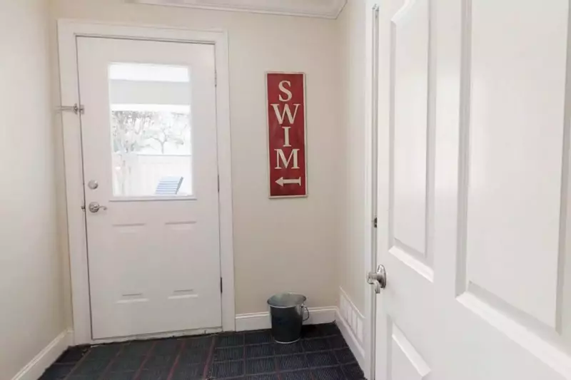 The ground level door leading to your private pool
