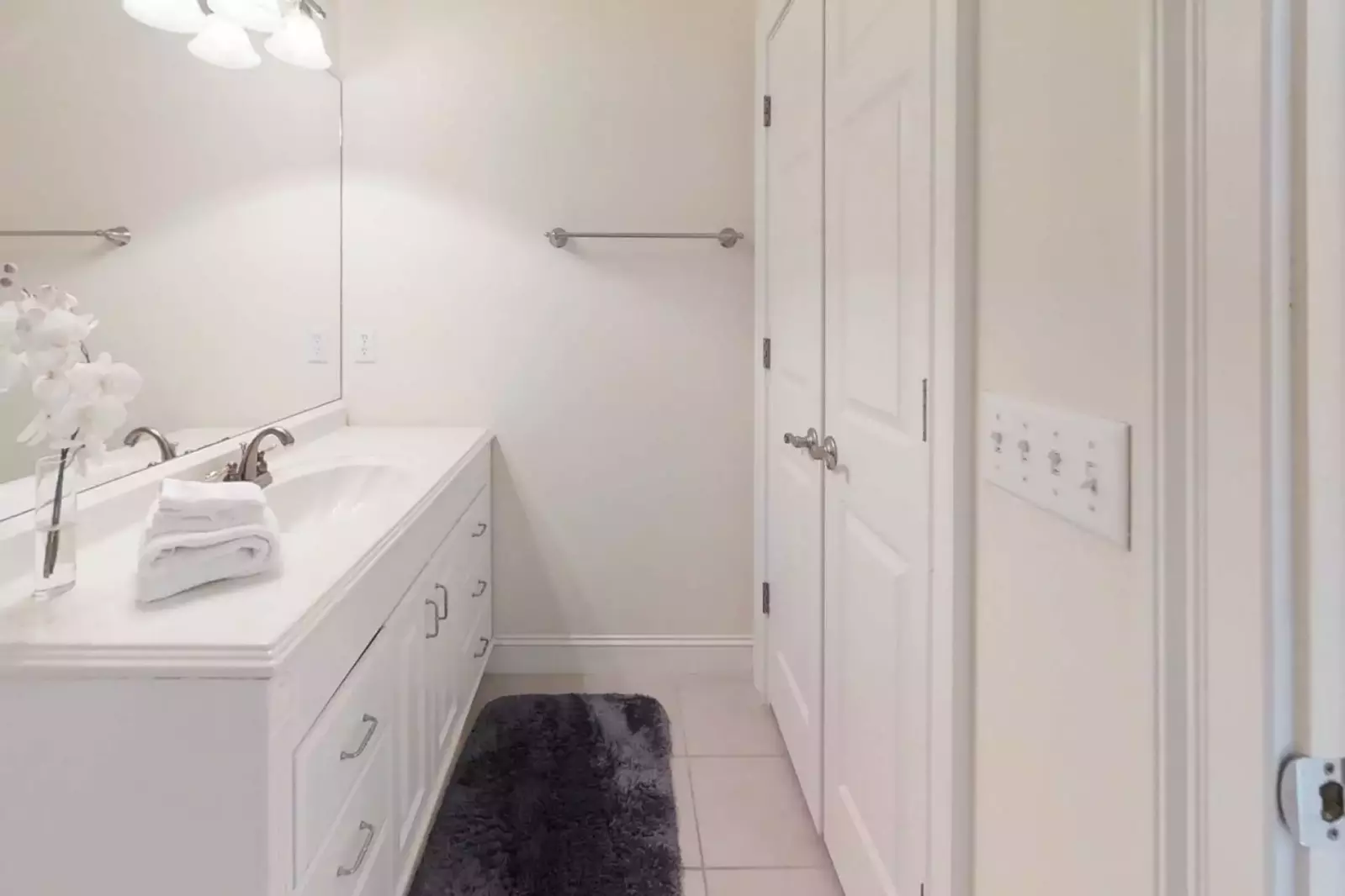 En suite bathroom for guest bedroom #4-complete with large closet and shower/tub combination
