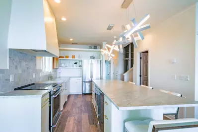 When you enter the home, you'll find this stunning kitchen with top of the line fixtures and appliances.