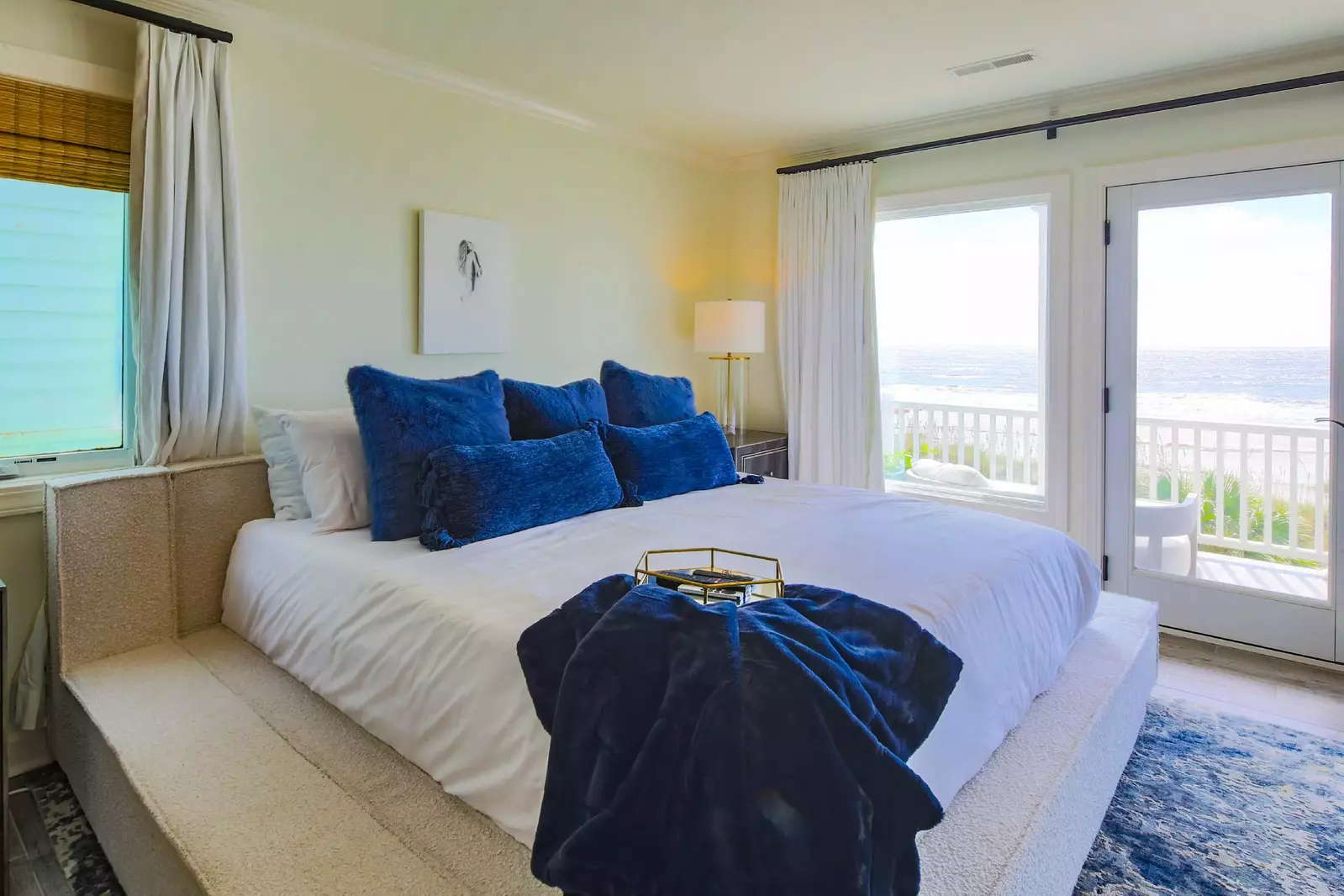 The primary suite also has access to a private balcony with ocean views.