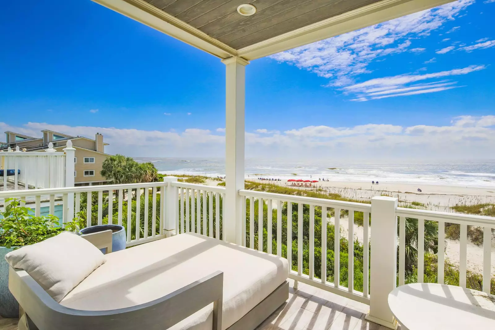Sit back on the partially covered balcony and feel the ocean breeze blow through your hair.