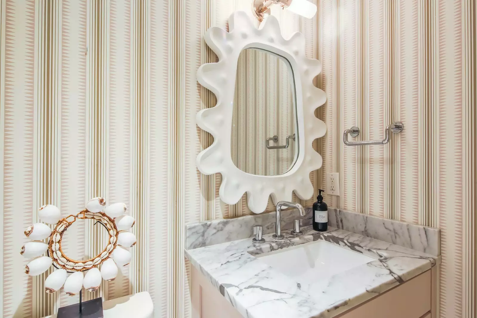 The en suite bathroom features a spacious vanity.