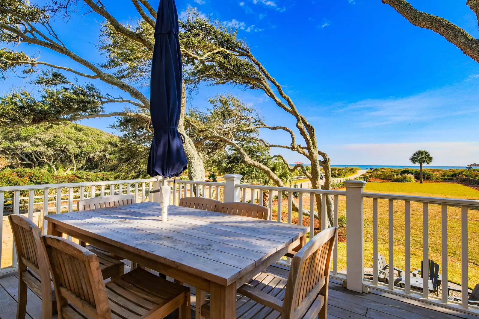 On the first floor deck, you'll find this dining table and gorgeous ocean views.