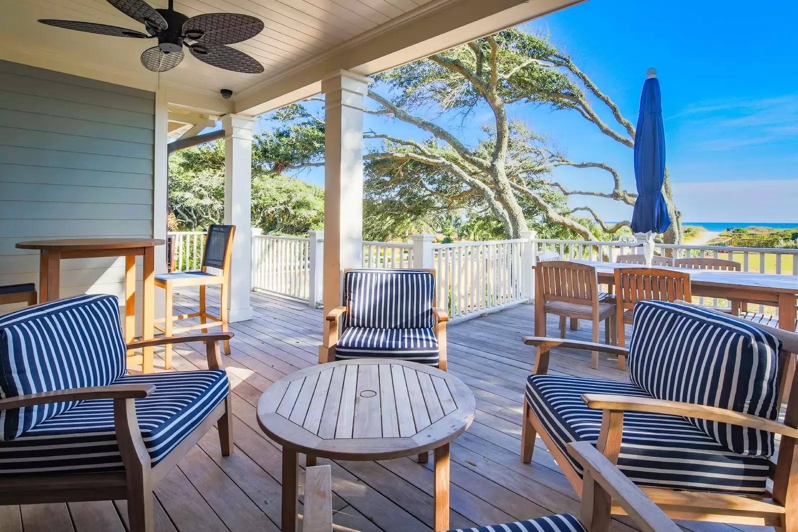 There is a seating area on the covered portion of the deck.