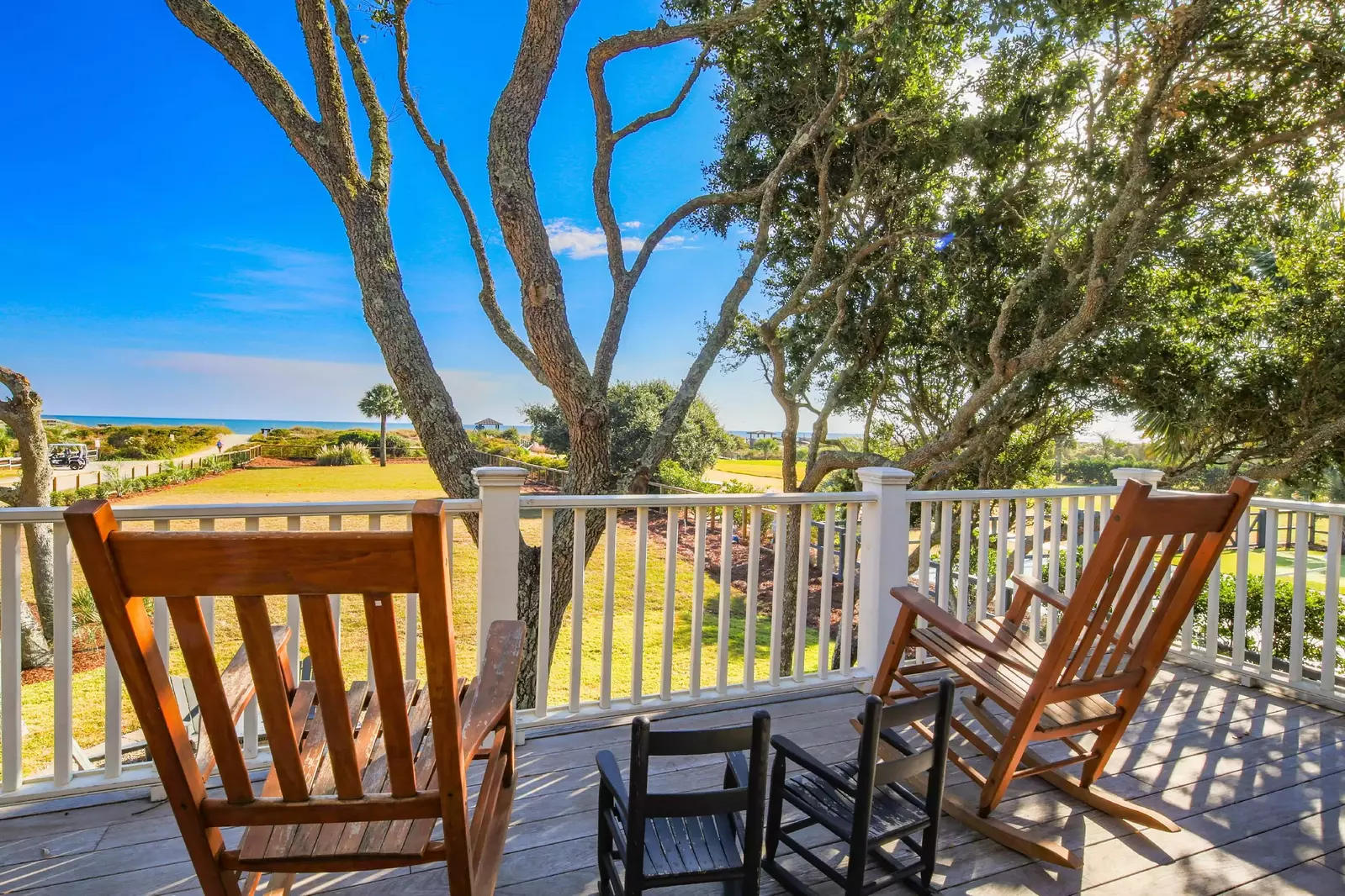 This covered porch is accessible from the second floor master suite and den.
