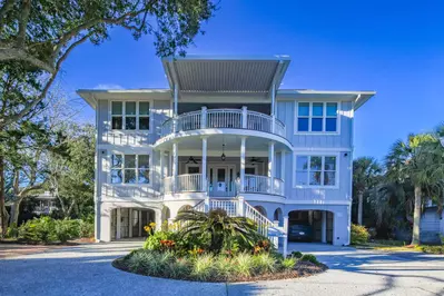 Sea Gem is a 3-story home across the street from the Isle of Palms beach.