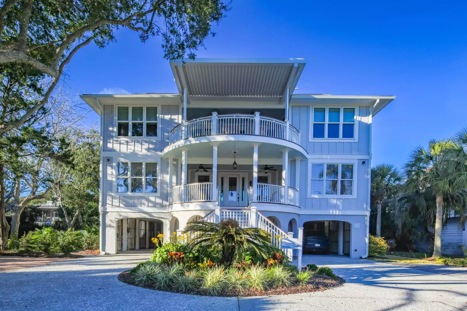 Sea Gem is a 3-story home across the street from the Isle of Palms beach.