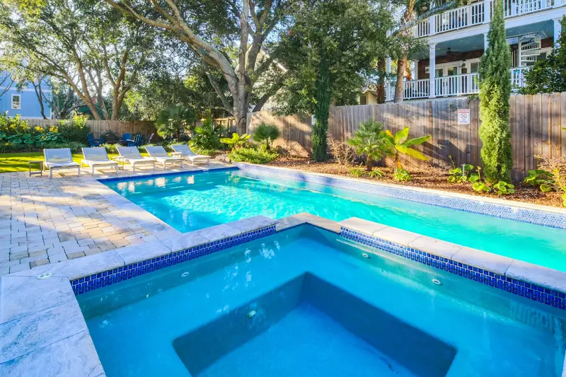 Relax, unwind and de-stress in the Isle of Palms vacation home's backyard oasis.