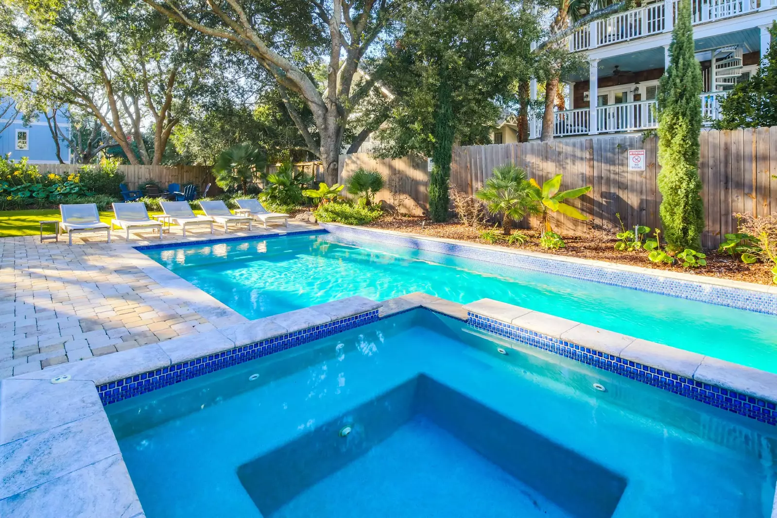 Relax, unwind and de-stress in the Isle of Palms vacation home's backyard oasis.
