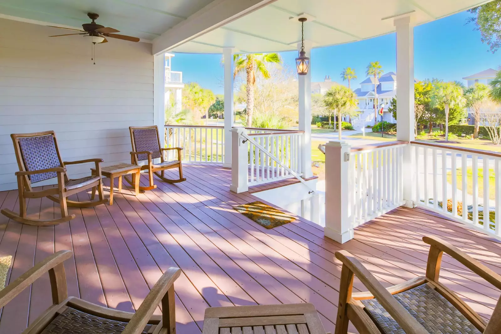 Follow the exterior staircase from the driveway to find the home's inviting front porch.