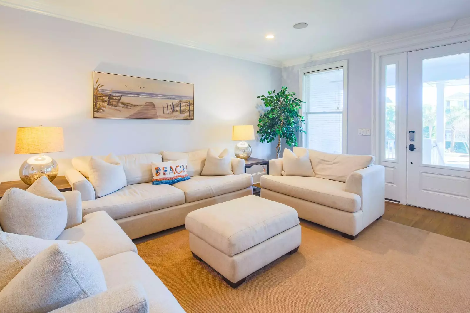 When you enter the home's front door, you'll find this comfortable den with spacious seating.