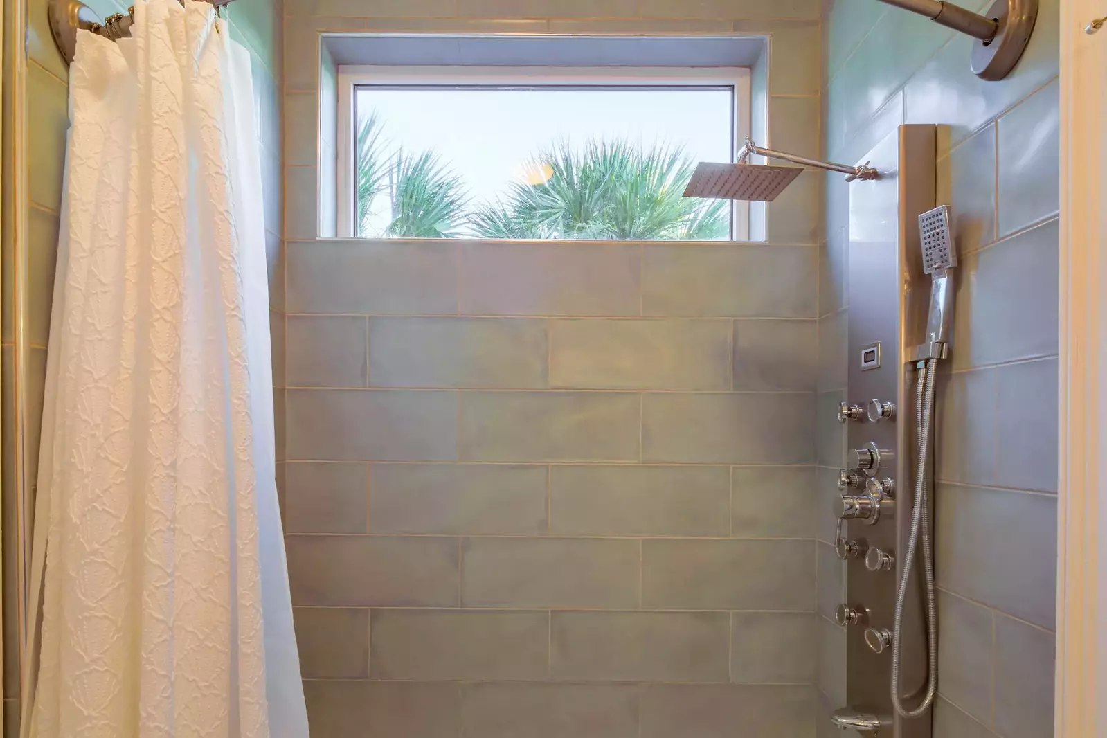 The Jack & Jill bathroom also has this tiled, shower/tub combo.