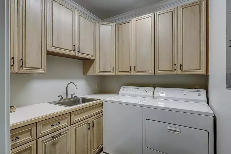 The laundry room with full size washer and dryer. A must for travelers!