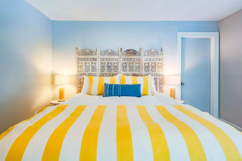 There is a closet to the right of the bed.