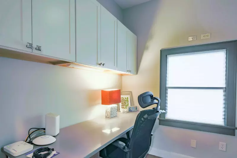 The home also has an office with a spacious desk & chair.