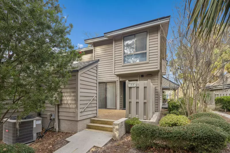The front of the townhouse and glimpse of side deck