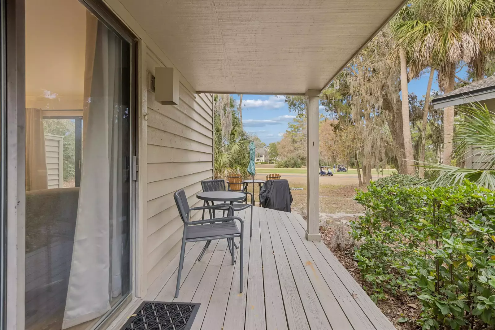 Side covered deck off the living room