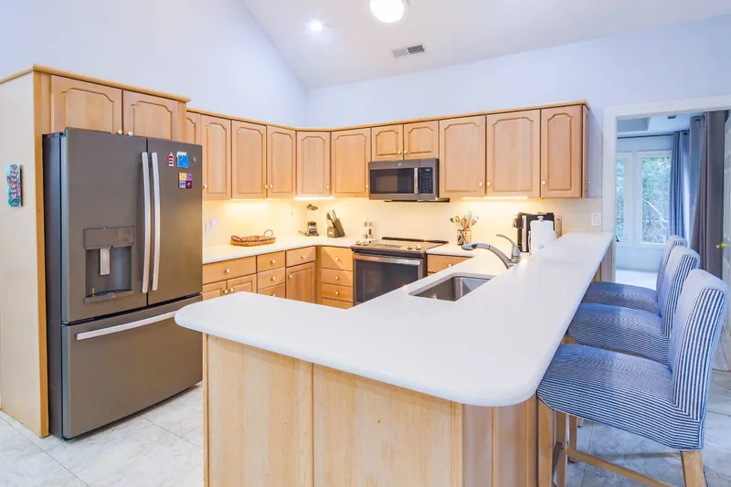 There's plenty of room in the well-stocked, spacious kitchen for your family to prepare their meals.