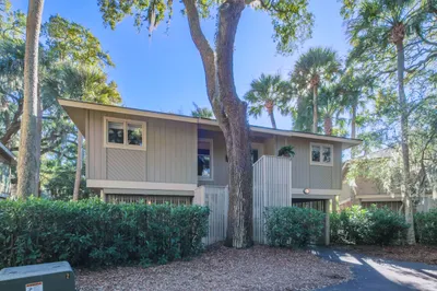 Serenity at Summer Wind is an elevated villa with a carport and storage area underneath the villa.