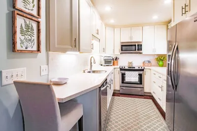 There is plenty room in this bright & cheery kitchen to prepare your family's meals.