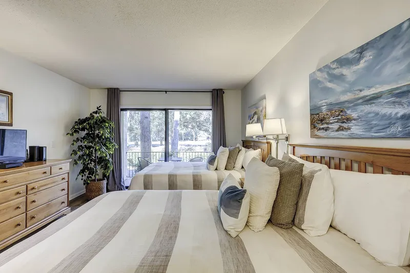 Guest Bedroom with Door Out to Balcony