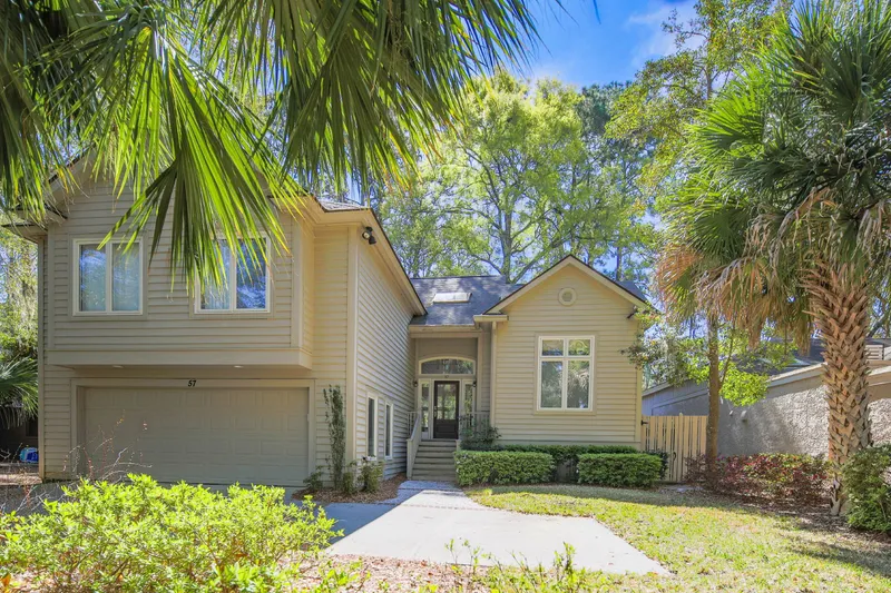 The Fairway House is a two story home within the gated Sea Pines community.
