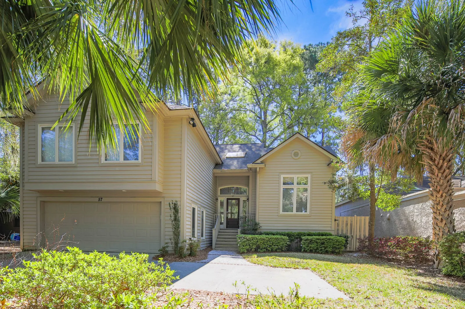 The Fairway House is a two story home within the gated Sea Pines community.