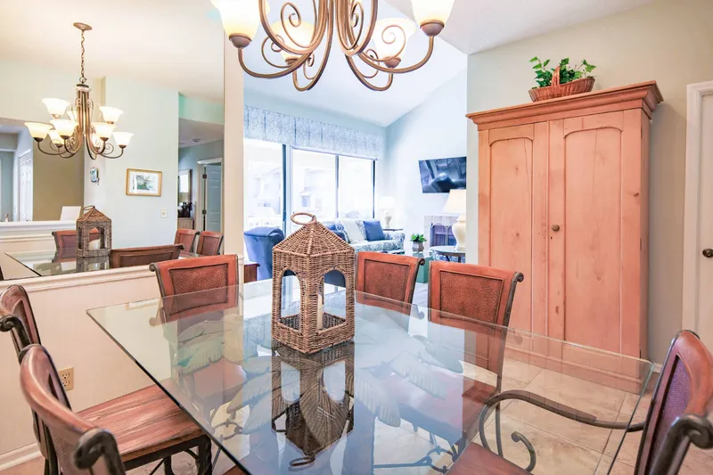 The dining table comfortably seats 6 people and there is an additional dining table on the back deck.