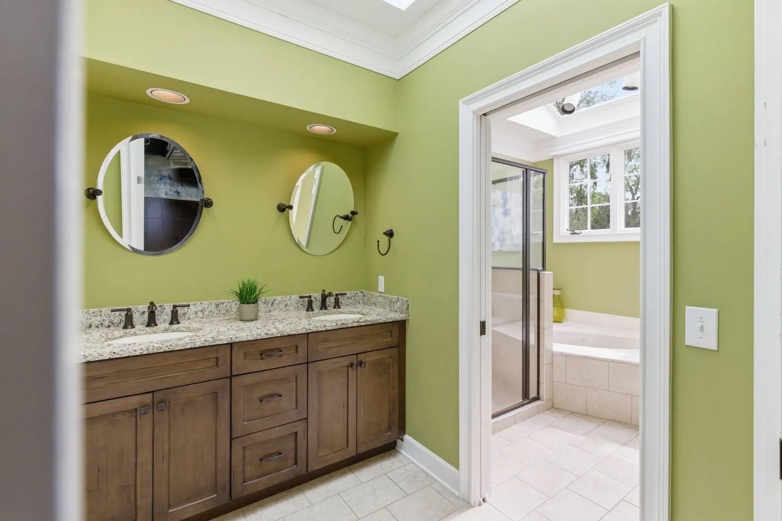 Primary en suite bath with soaking tub and walk-in shower