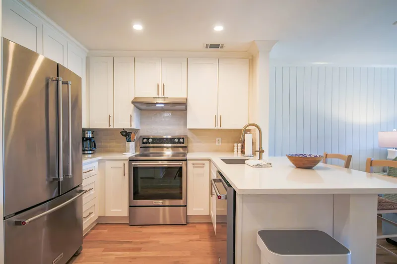 When you enter the front door, you'll find this beautifully renovated kitchen.