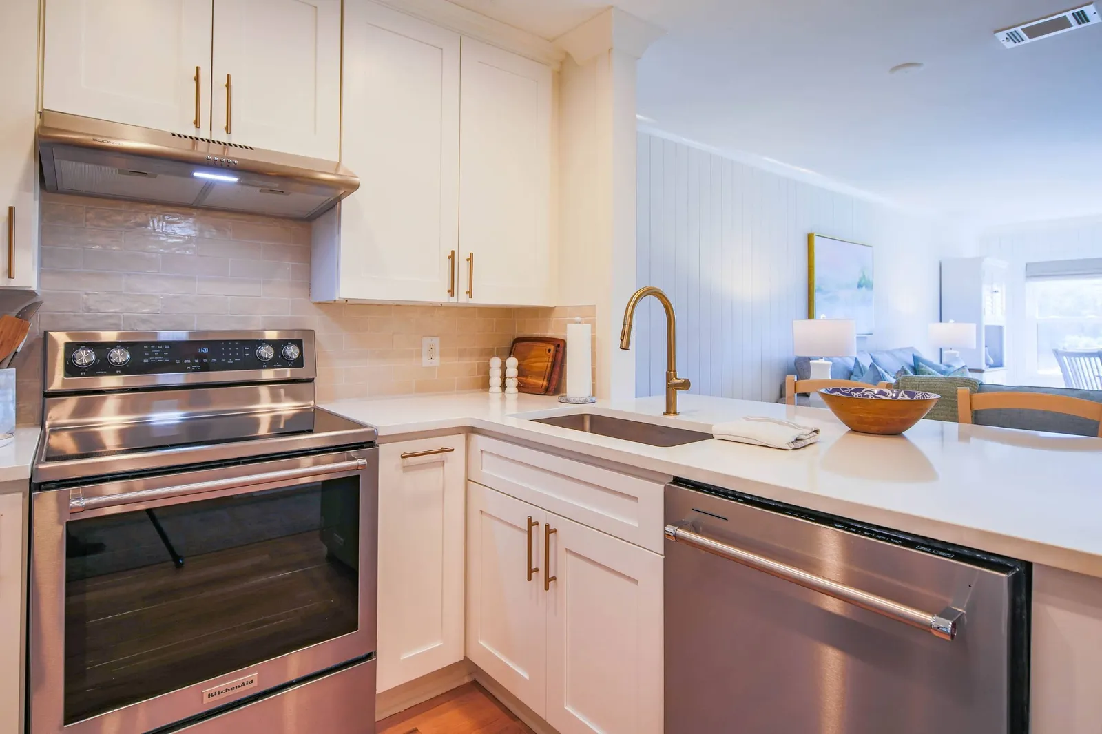 There is an open floor plan layout between the kitchen, living room and dining area.