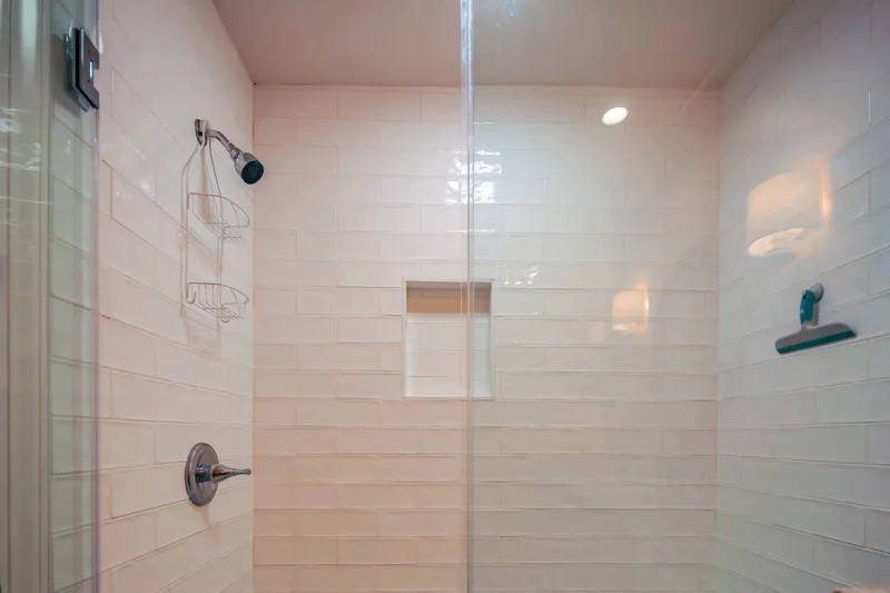 There is also a tiled, walk-in shower in the bathroom.