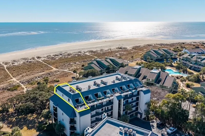 A Wave From It All is the penthouse unit marked in yellow on this photo.