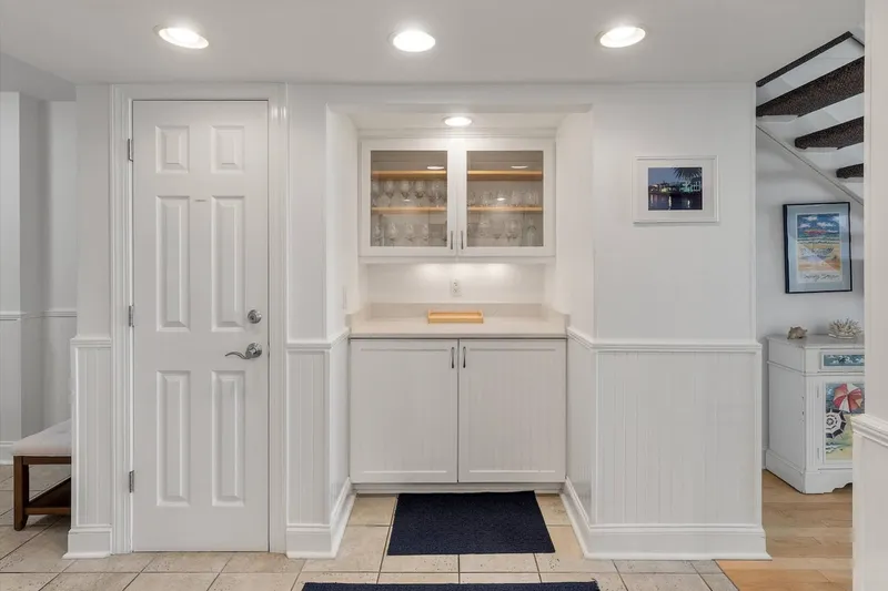 There are additional cabinets & storage area on the other side of the kitchen.