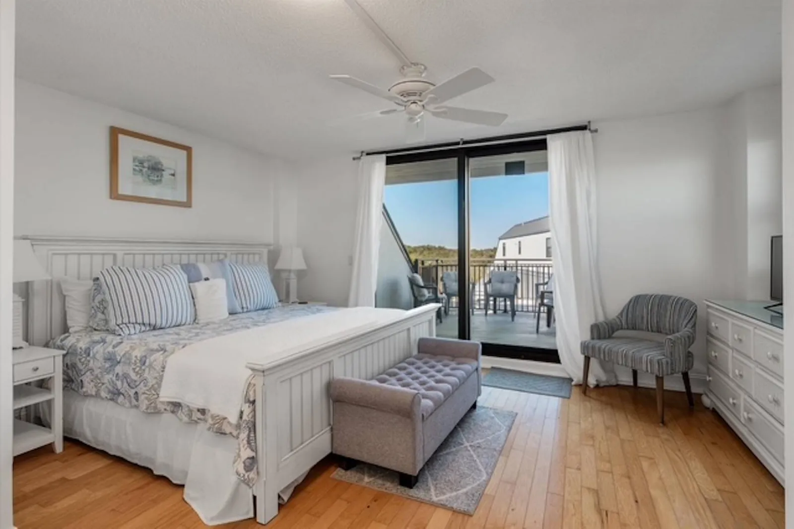 The guest suite also has an arm chair, dresser and smart TV.